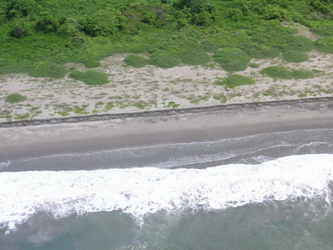 This image shows a berm that ran along the coast of most of the San Juan del Gozo peninsula and prevented the wave from penetration too far inland. The berm was also responsible for runup height being generally lower than maximum tsunami heights. 